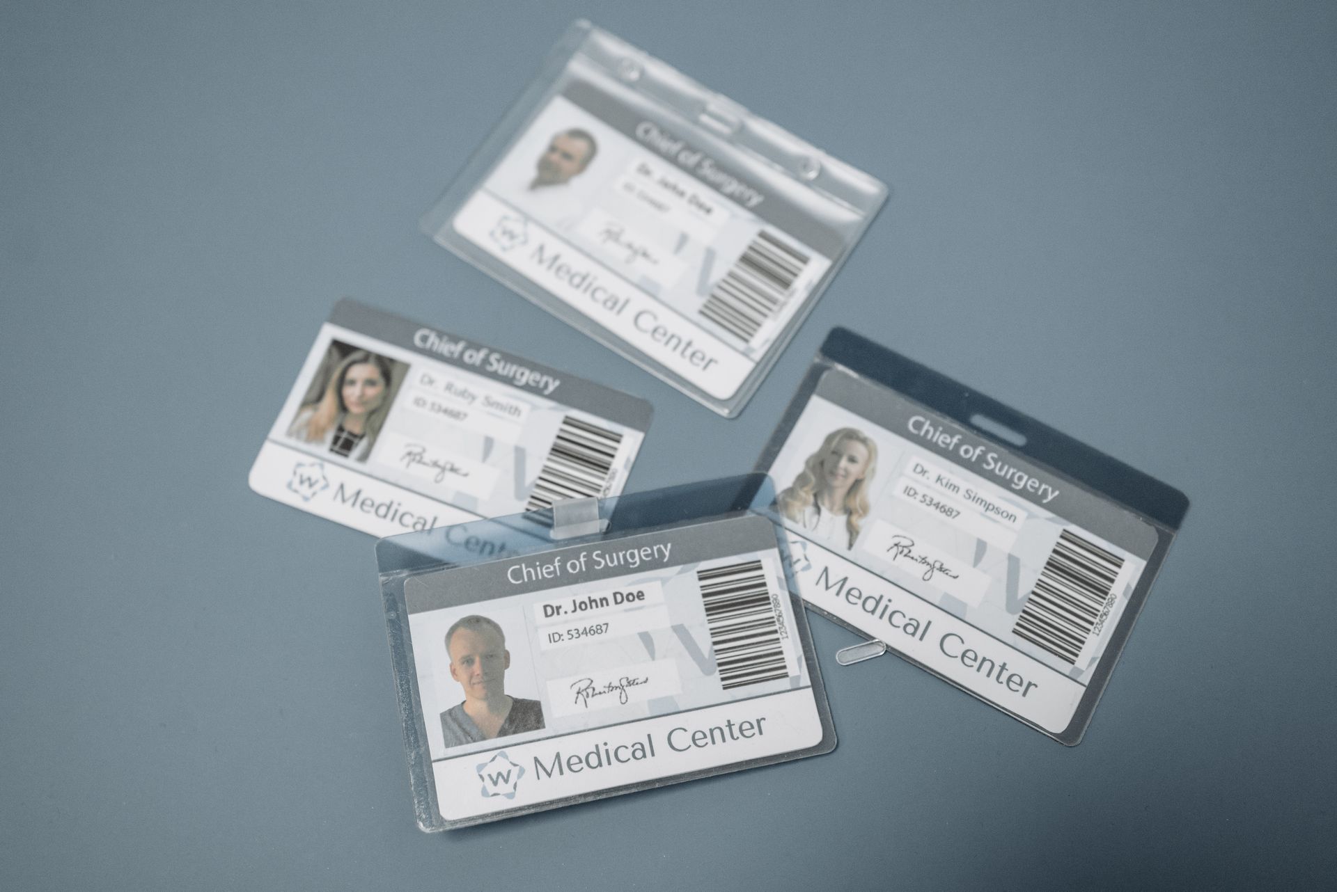 Close-up of medical professional ID badges and credentials